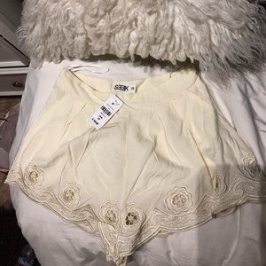 Cream colored LF shorts